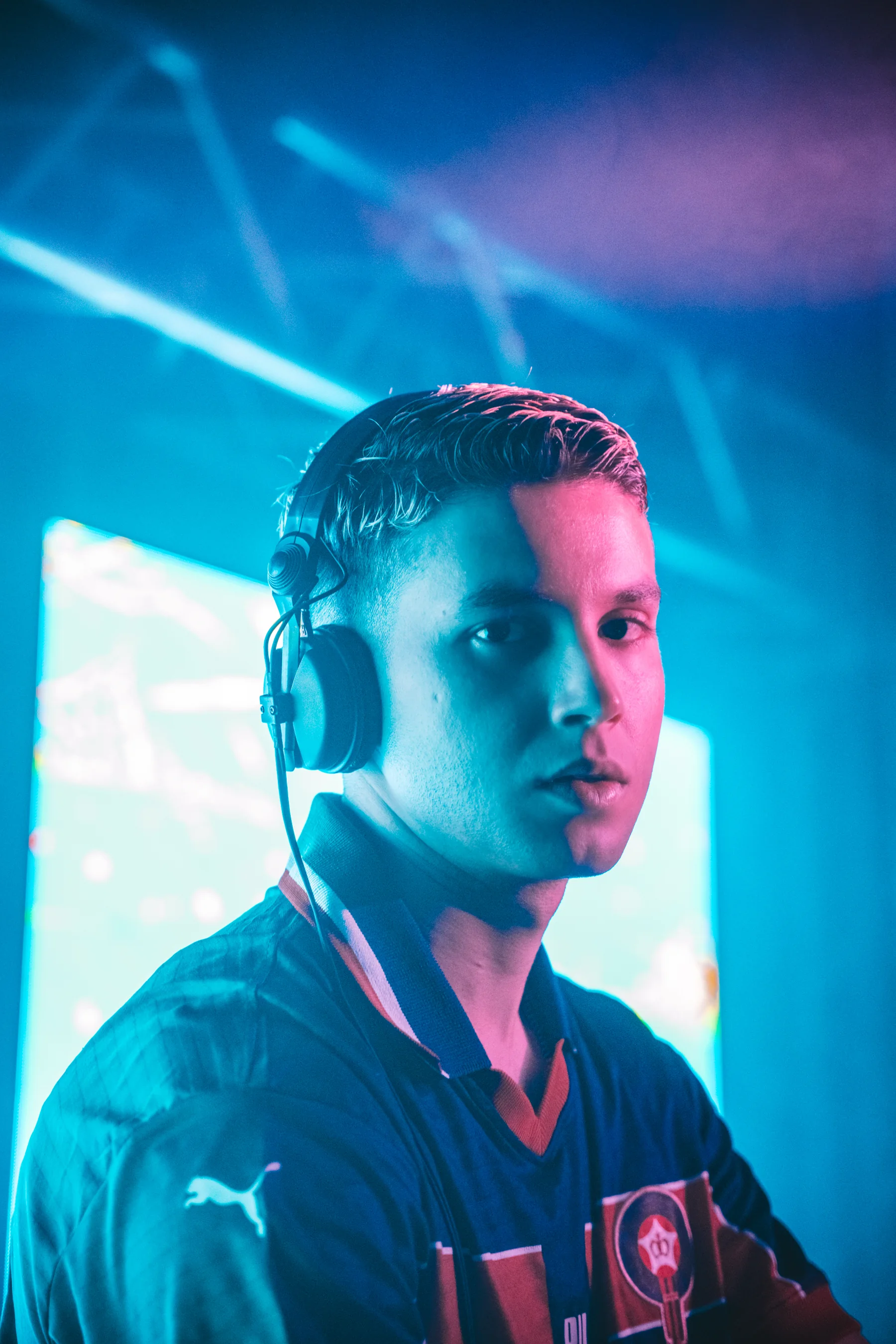 KASSABI portrait with cyan and magenta lighting